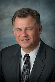 Larry E. Ott